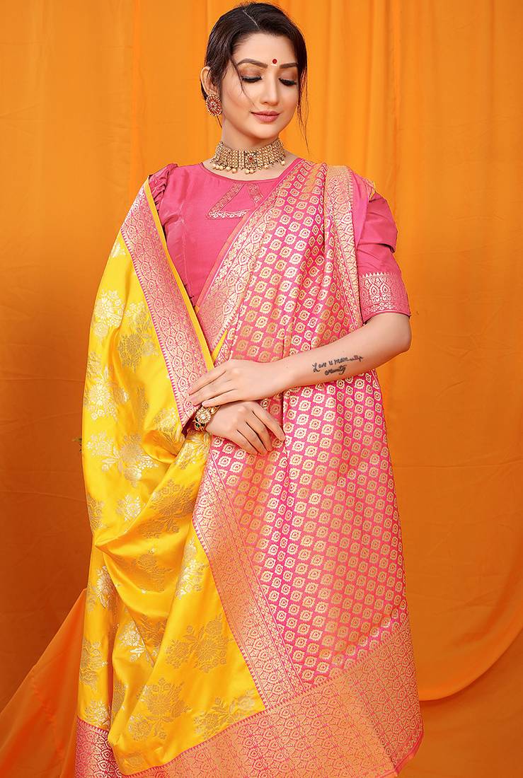 Yellow banarasi silk blend saree with pink zari woven border