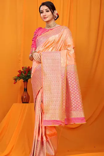 Peach banarasi silk blend saree with pink zari woven border