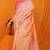 Peach banarasi silk blend saree with pink zari woven border