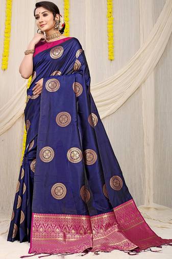Navy blue silk blend saree with teal zari border and circular motifs