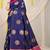 Navy blue silk blend saree with teal zari border and circular motifs