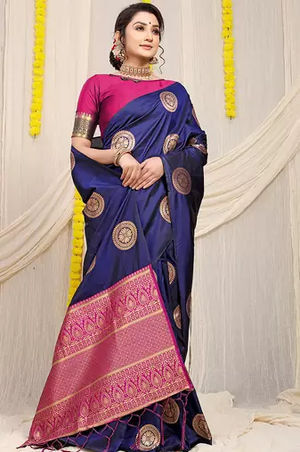 Navy blue silk blend saree with teal zari border and circular motifs