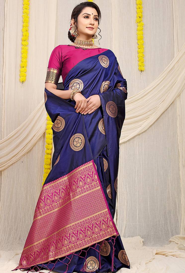 Navy blue silk blend saree with teal zari border and circular motifs