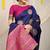 Navy blue silk blend saree with teal zari border and circular motifs