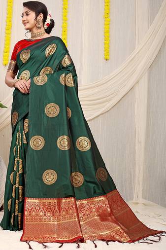 Bottle green silk blend saree with red zari border and circular motifs