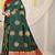Bottle green silk blend saree with red zari border and circular motifs
