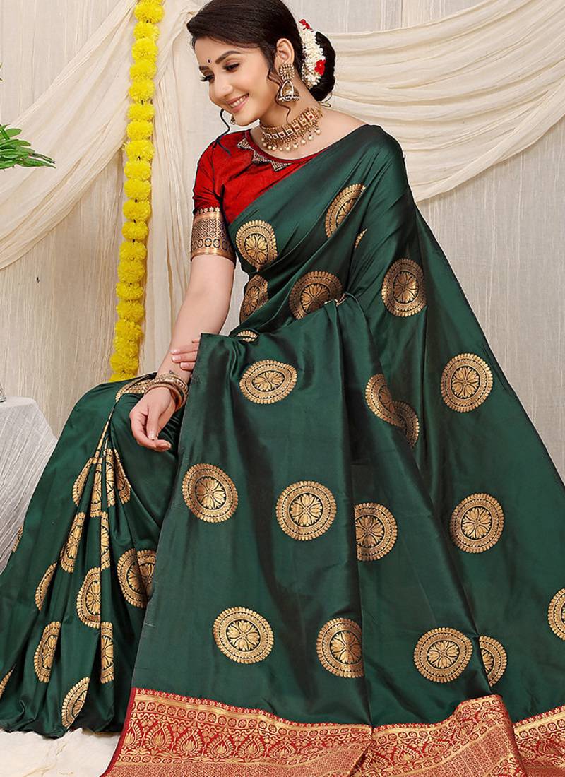 Bottle green silk blend saree with red zari border and circular motifs