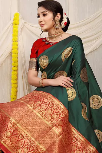 Bottle green silk blend saree with red zari border and circular motifs