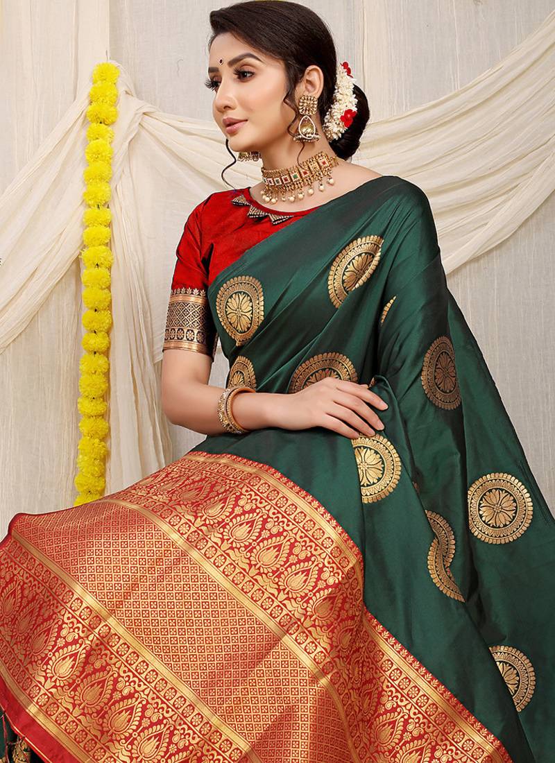 Bottle green silk blend saree with red zari border and circular motifs