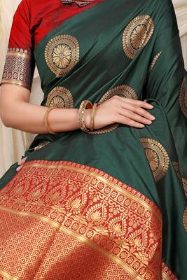 Bottle green silk blend saree with red zari border and circular motifs 4