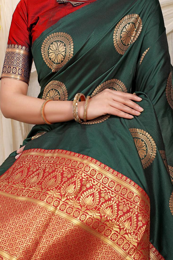 Bottle green silk blend saree with red zari border and circular motifs