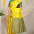 Yellow silk blend saree with teal zari border and circular motifs