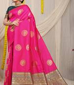 Rani pink silk blend saree with bottle green zari border and circular motifs