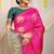 Rani pink silk blend saree with bottle green zari border and circular motifs