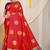 Red silk blend saree with wine zari border and circular motifs