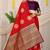 Red silk blend saree with wine zari border and circular motifs