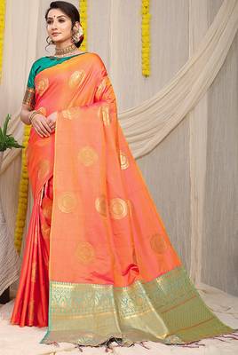 Peach silk blend saree with turquoise zari border and circular motifs 1