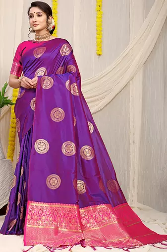 Purple silk blend saree with rani pink zari border and circular motifs