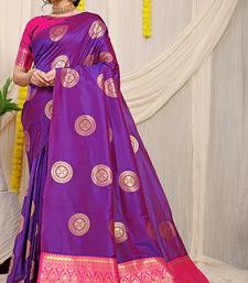 Purple silk blend saree with rani pink zari border and circular motifs