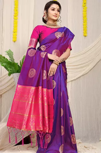 Purple silk blend saree with rani pink zari border and circular motifs