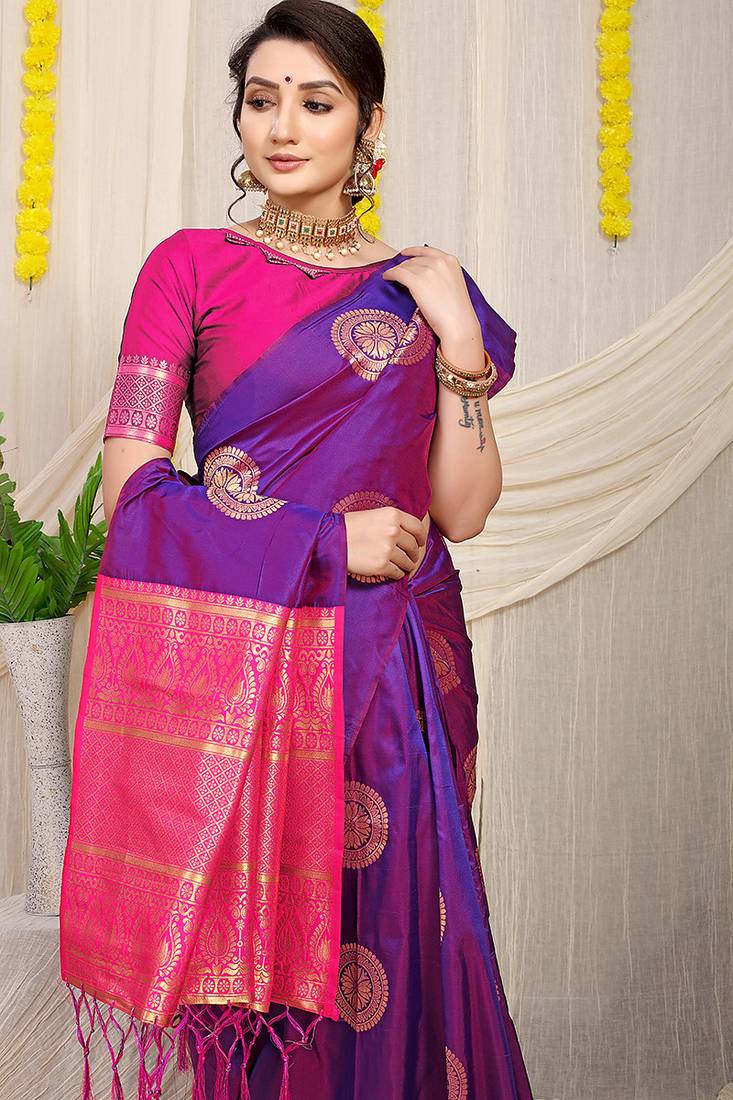 Purple silk blend saree with rani pink zari border and circular motifs