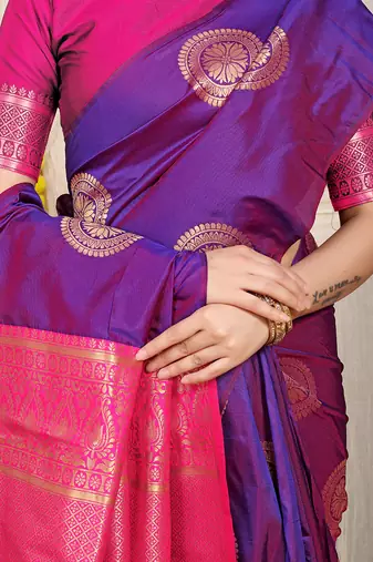 Purple silk blend saree with rani pink zari border and circular motifs
