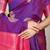 Purple silk blend saree with rani pink zari border and circular motifs