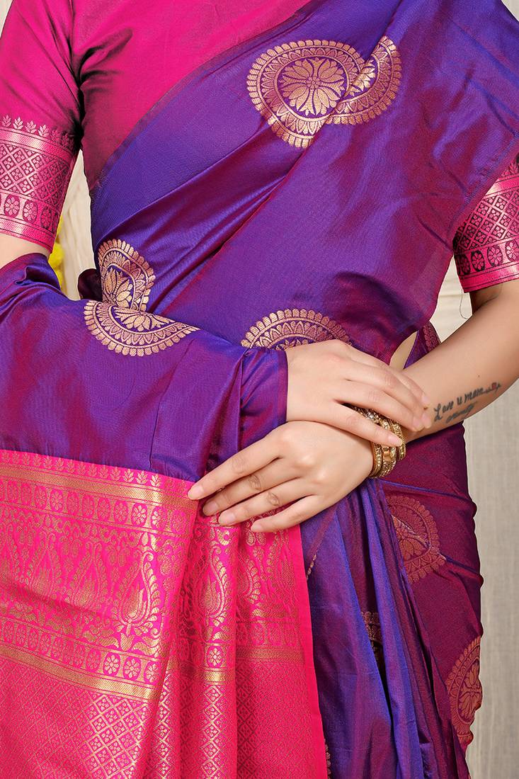 Purple silk blend saree with rani pink zari border and circular motifs