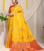 Mustard yellow silk blend saree with red zari border and circular motifs