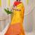 Mustard yellow silk blend saree with red zari border and circular motifs