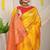 Mustard yellow silk blend saree with red zari border and circular motifs