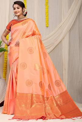 Light peach silk blend saree with rust orange zari border and circular motifs 1