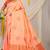 Light peach silk blend saree with rust orange zari border and circular motifs