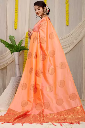 Light peach silk blend saree with rust orange zari border and circular motifs