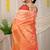 Light peach silk blend saree with rust orange zari border and circular motifs