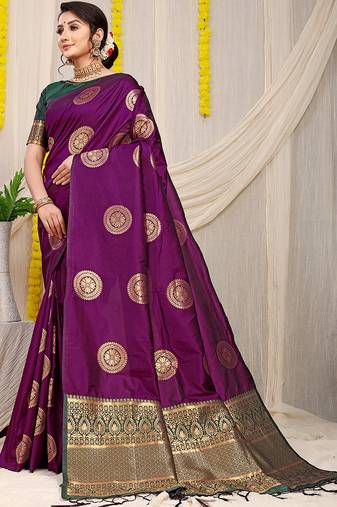 Wine purple silk blend saree with bottle green zari border and circular motifs