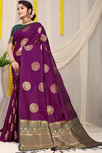 Wine purple silk blend saree with bottle green zari border and circular motifs