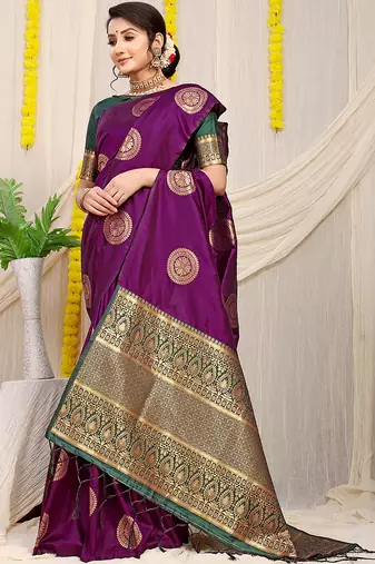 Wine purple silk blend saree with bottle green zari border and circular motifs