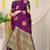 Wine purple silk blend saree with bottle green zari border and circular motifs
