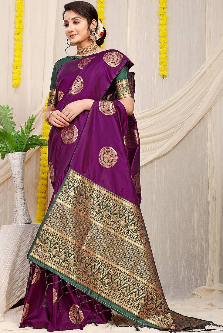 Wine purple silk blend saree with bottle green zari border and circular motifs