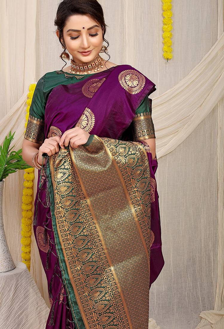 Wine purple silk blend saree with bottle green zari border and circular motifs
