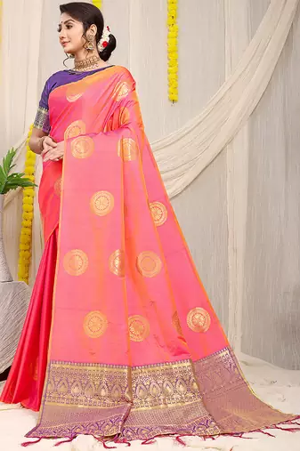 Pink silk blend saree with purple zari border and circular motifs