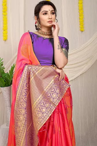 Pink silk blend saree with purple zari border and circular motifs