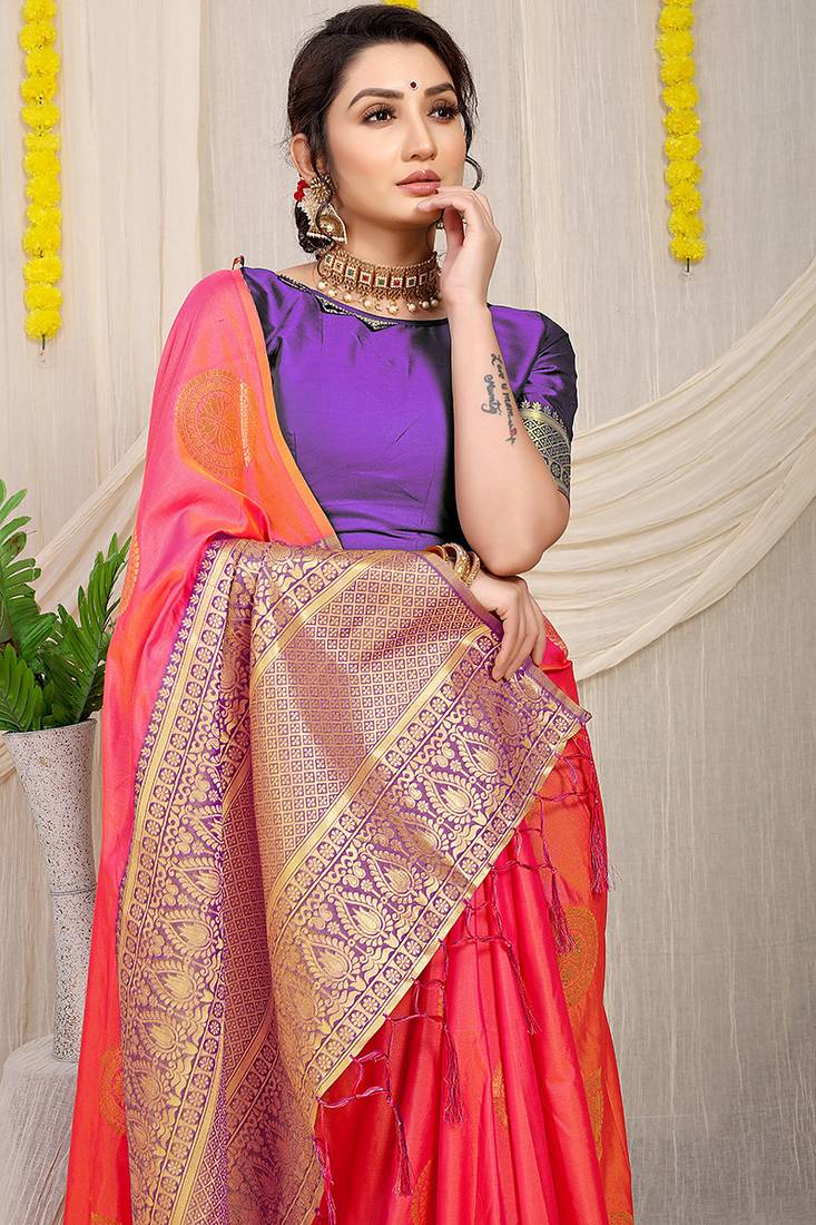 Pink silk blend saree with purple zari border and circular motifs
