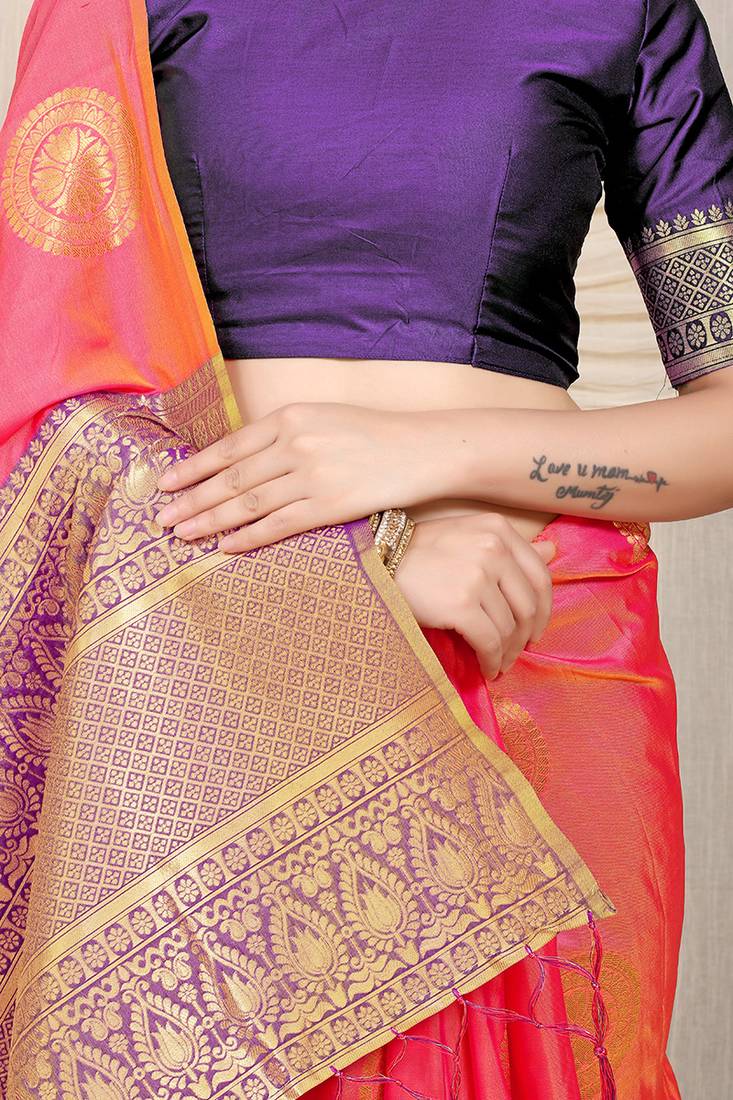 Pink silk blend saree with purple zari border and circular motifs