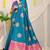 Teal blue silk blend saree with magenta pink zari border and circular motifs