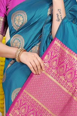 Teal blue silk blend saree with magenta pink zari border and circular motifs 4