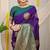Purple silk blend saree with teal zari border and circular motifs