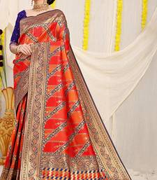 Red & orange patola silk blend saree with royal blue  zari border