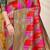 Rani pink & red patola silk blend saree with dark green zari border